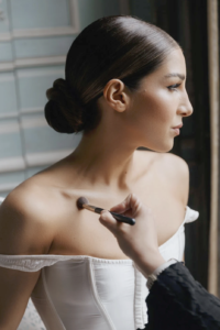 Bride getting ready by the best Sydney bridal hair and makeup artist Sarah at Blossom